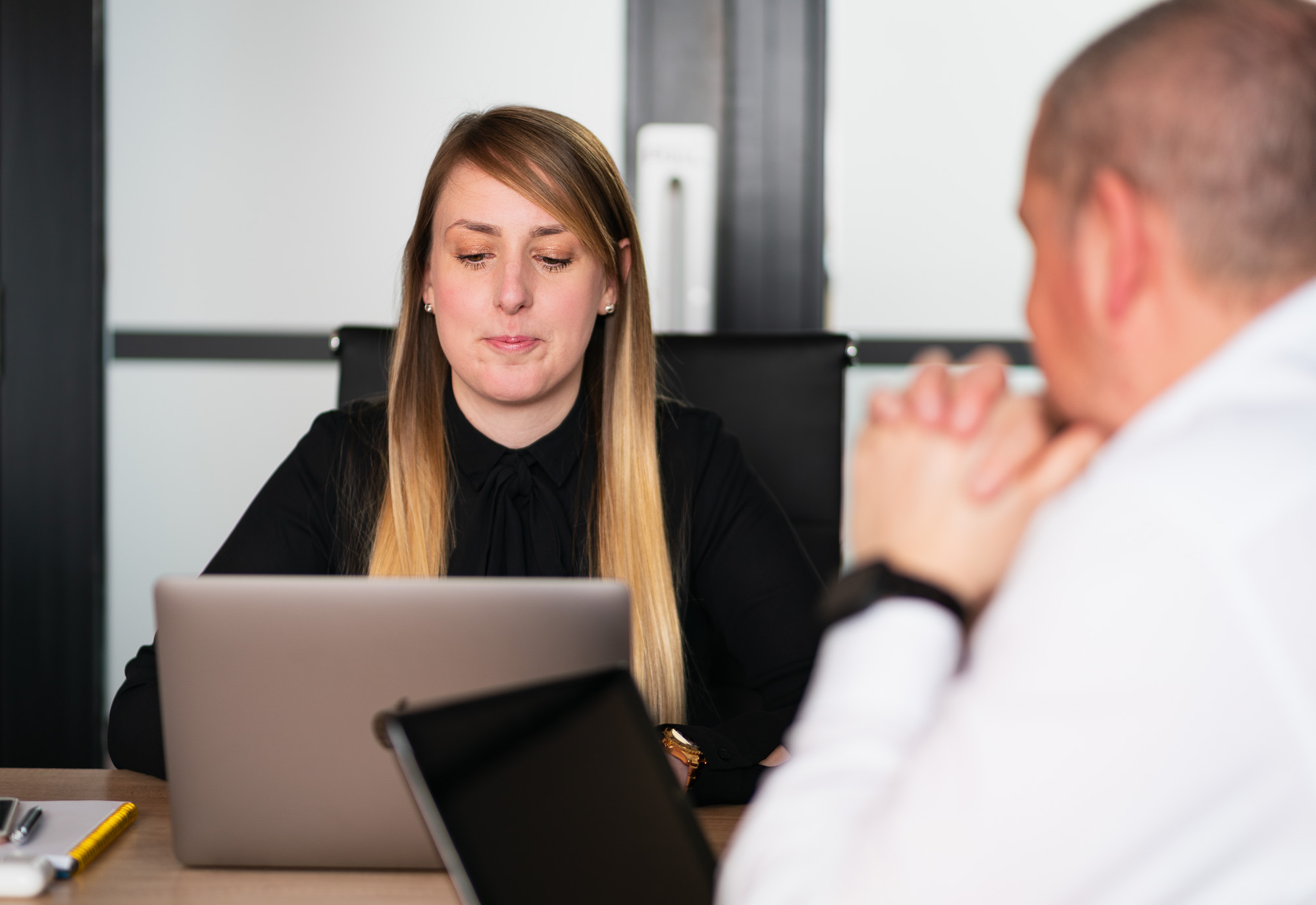 Marketing consultant developing a marketing strategy for an automotive business in a collaborative session